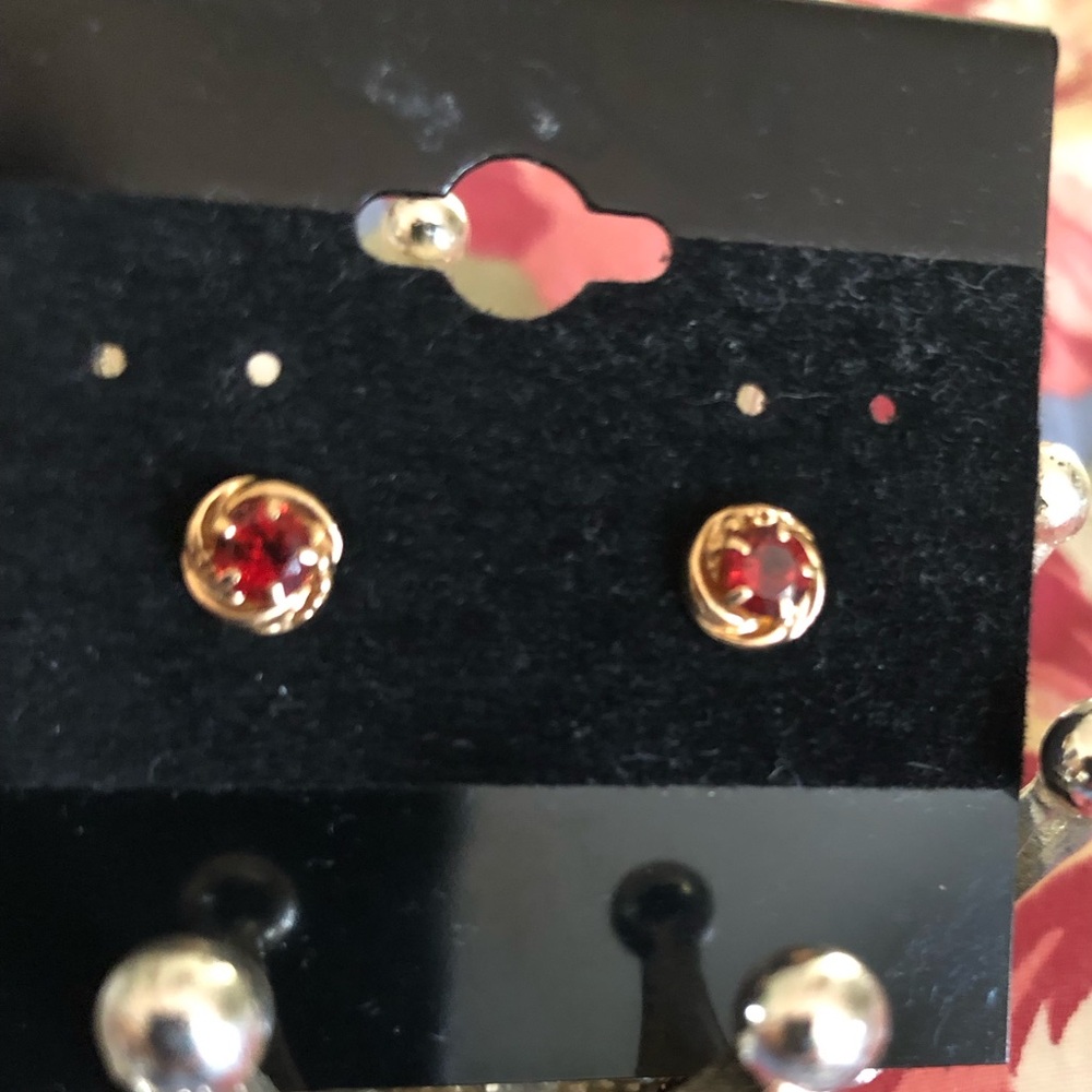 Small Garnet Gold studs, stamped 585.